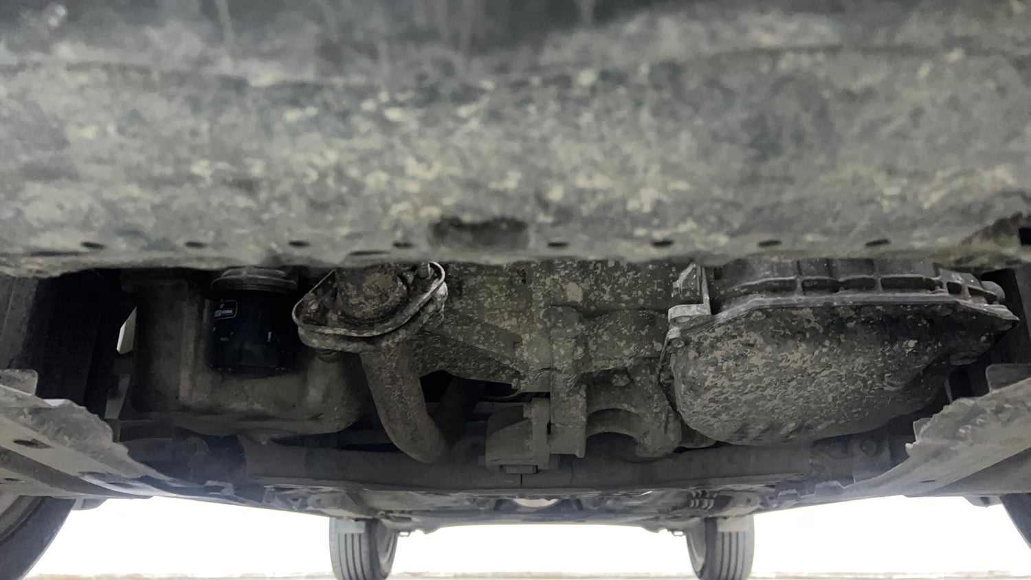 Used 2021 Maruti Suzuki Baleno Zeta Automatic Petrol Automatic extra FRONT LEFT UNDERBODY VIEW