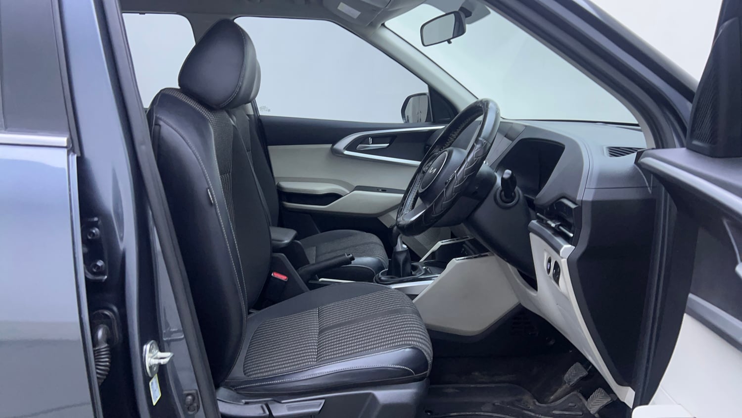 Used 2023 Kia Carens Prestige Plus 1.4 Petrol MT 7 STR Petrol Manual interior RIGHT SIDE FRONT DOOR CABIN VIEW