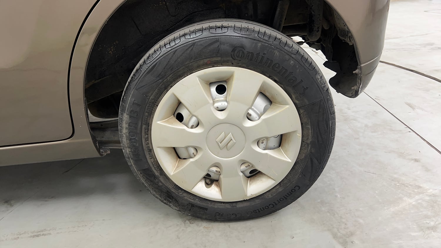 Used 2014 Maruti Suzuki Wagon R LXI CNG Cng Manual tyres LEFT REAR TYRE RIM VIEW
