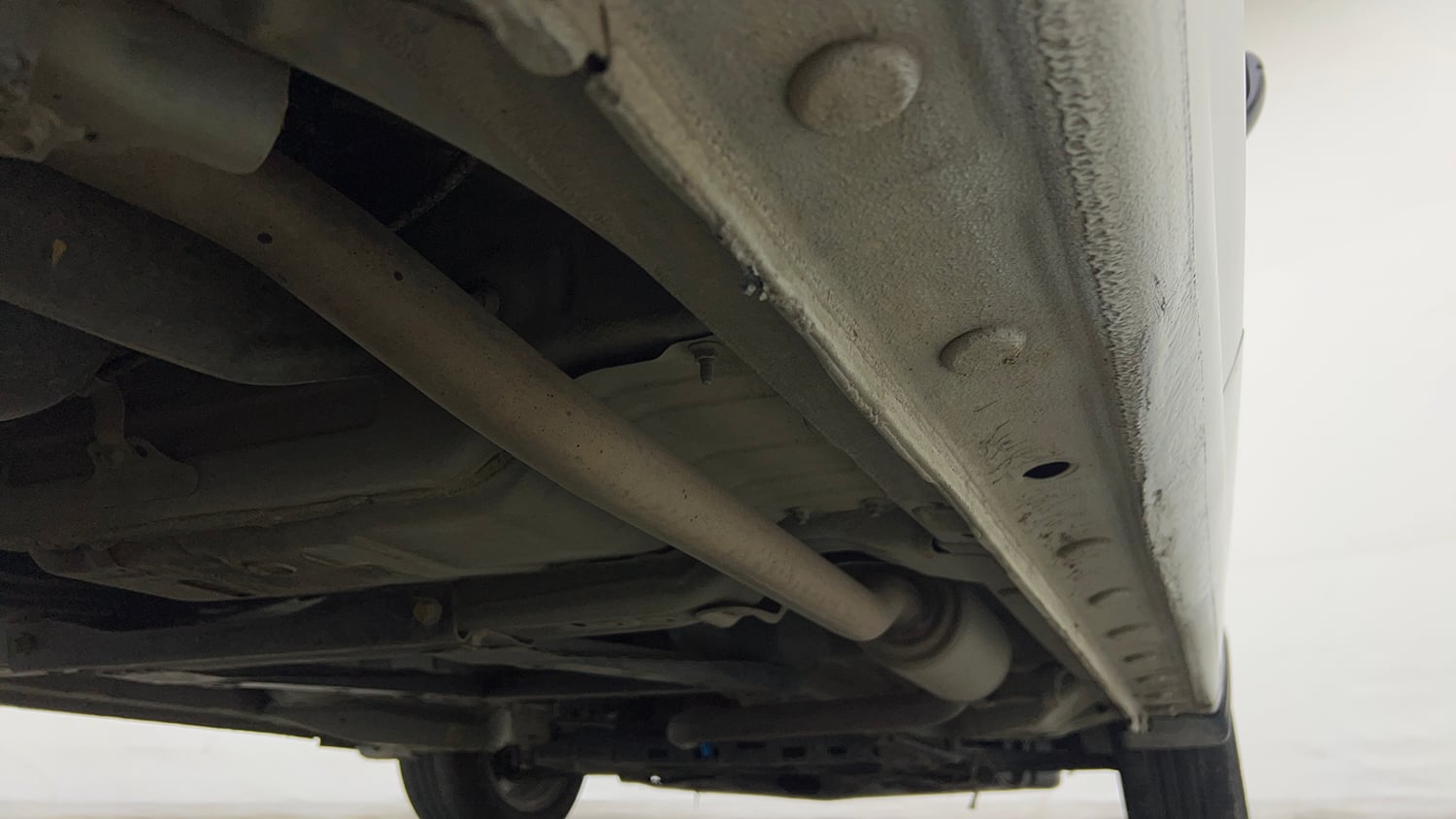 Used 2024 Honda City Elegant Edition CVT Petrol Automatic extra REAR RIGHT UNDERBODY VIEW