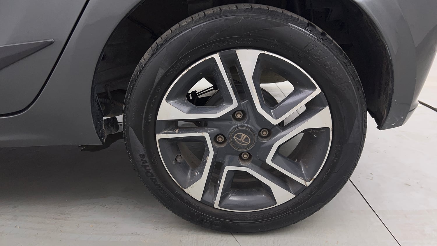 Used 2023 Tata Tiago XZ Plus Petrol Manual tyres LEFT REAR TYRE RIM VIEW