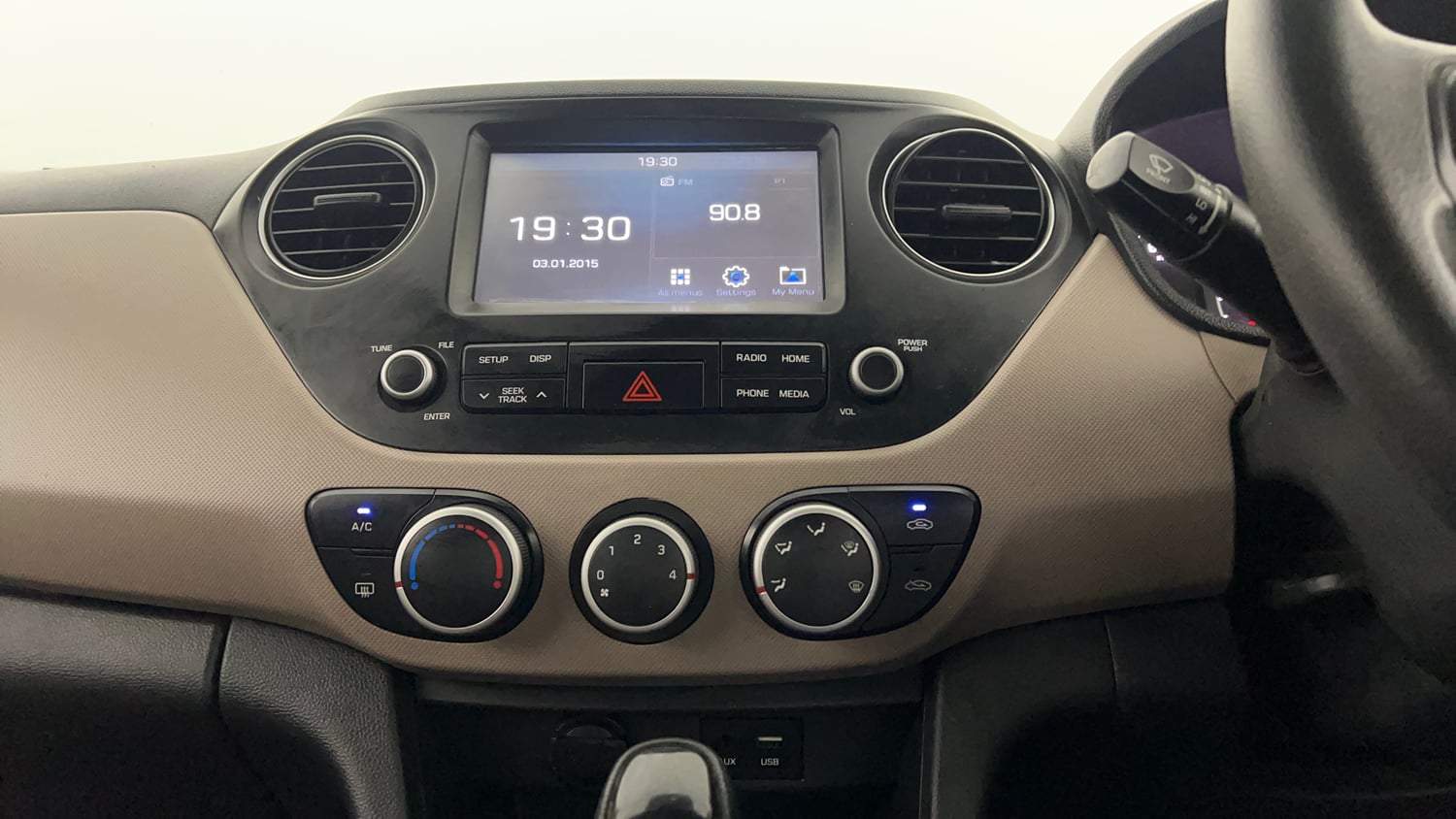 Used 2019 Hyundai Grand i10 Sportz AT 1.2 Kappa VTVT Petrol Automatic interior MUSIC SYSTEM & AC CONTROL VIEW