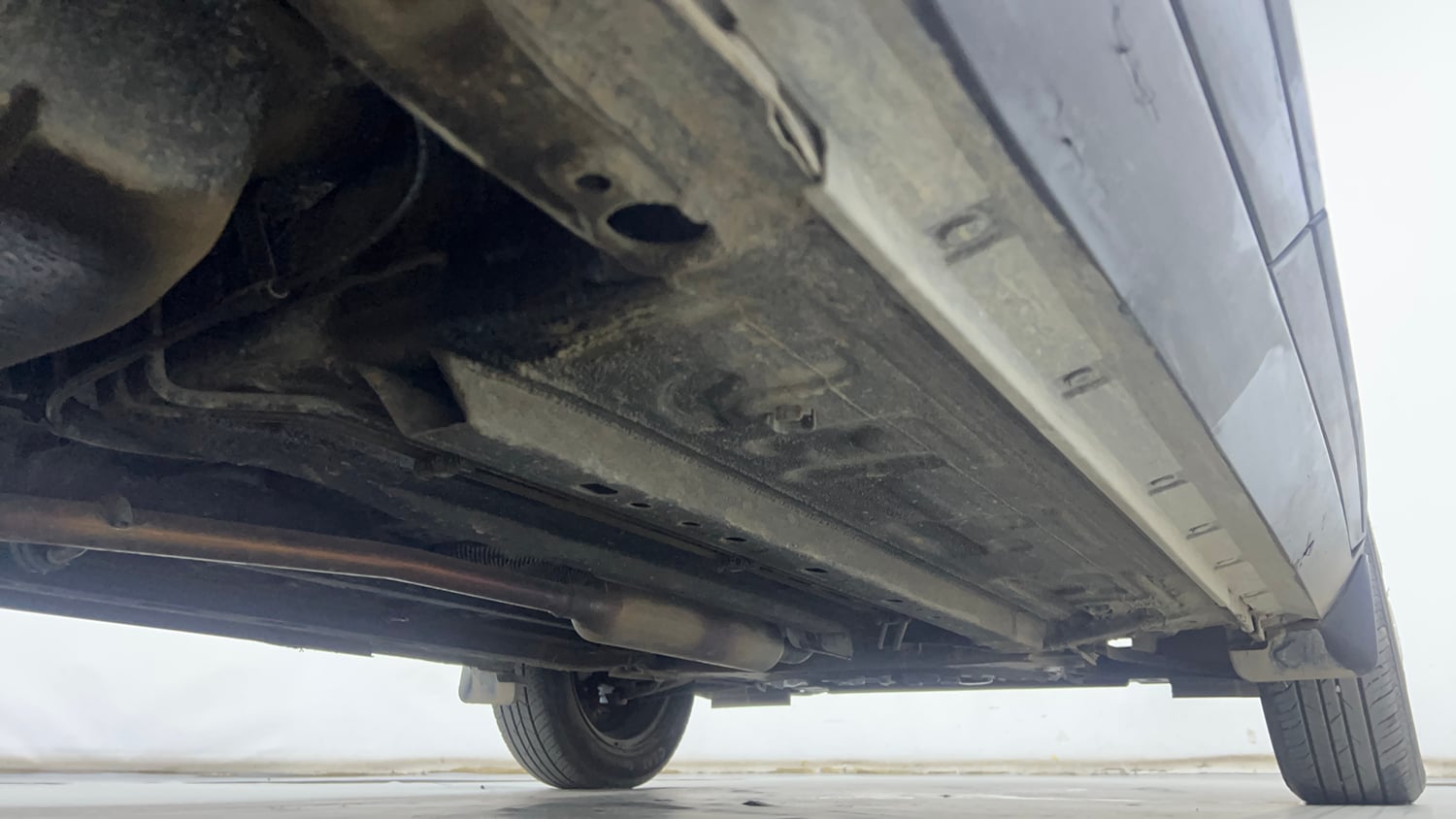 Used 2024 Nissan Magnite XE AMT Petrol Automatic extra REAR RIGHT UNDERBODY VIEW