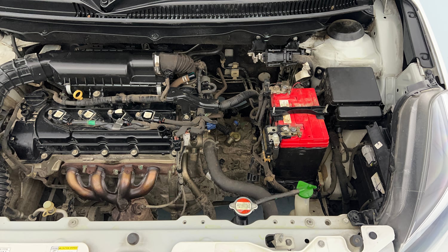 Used 2020 Maruti Suzuki Baleno Delta Petrol Manual engine ENGINE LEFT SIDE VIEW