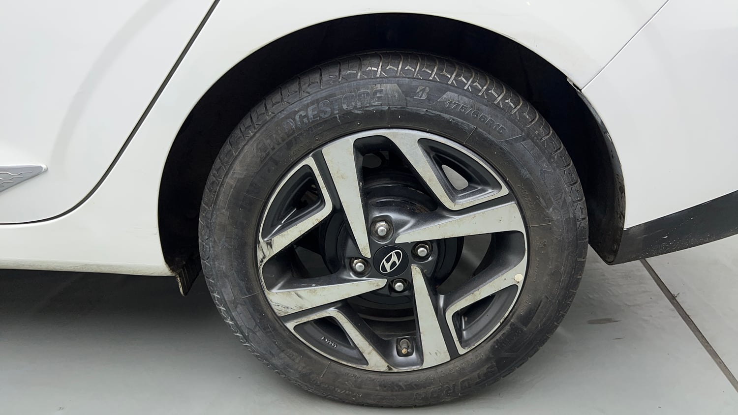 Used 2021 Hyundai Aura SX Plus 1.2 AMT Petrol Petrol Automatic tyres LEFT REAR TYRE RIM VIEW