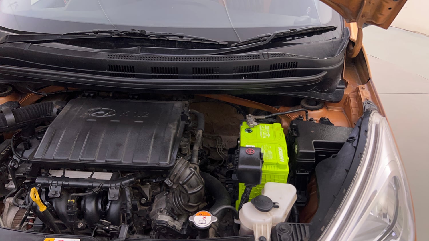 Used 2013 Hyundai Grand i10 Sportz 1.2 Kappa VTVT Petrol Manual engine ENGINE LEFT SIDE HINGE & APRON VIEW