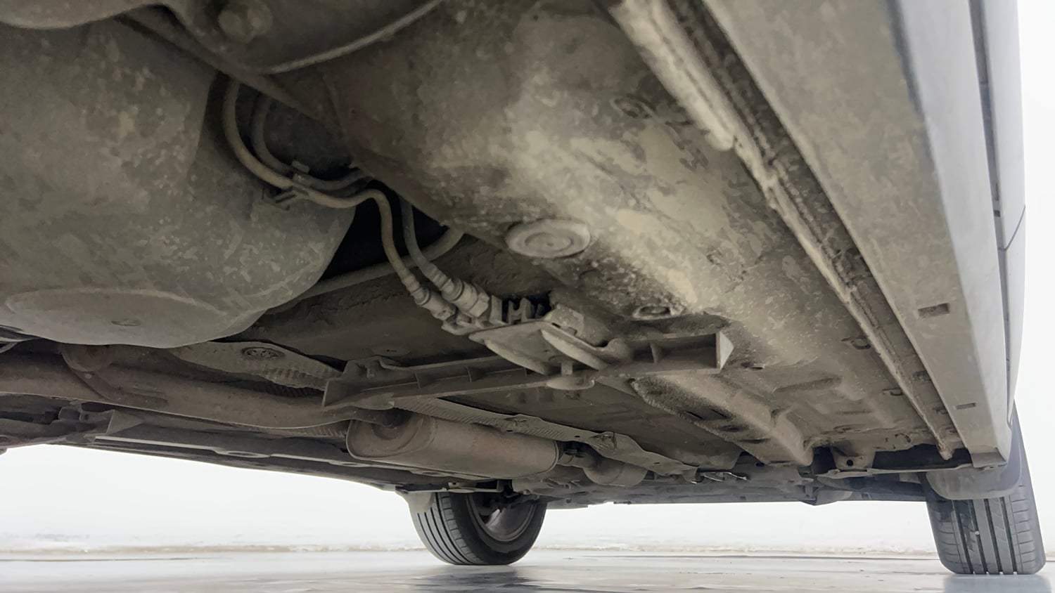 Used 2022 Volkswagen Taigun Topline 1.0 TSI MT Petrol Manual extra REAR RIGHT UNDERBODY VIEW