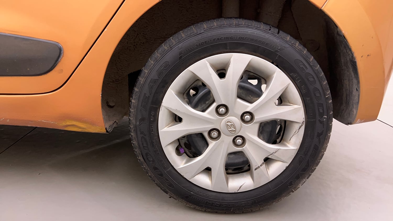 Used 2013 Hyundai Grand i10 Sportz 1.2 Kappa VTVT Petrol Manual tyres LEFT REAR TYRE RIM VIEW