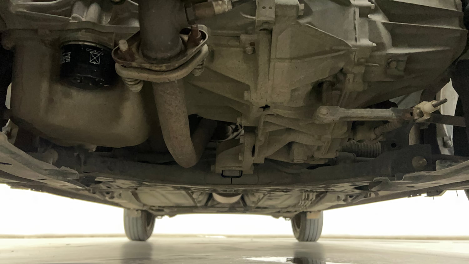 Used 2021 Maruti Suzuki Baleno Delta Petrol Manual extra FRONT LEFT UNDERBODY VIEW
