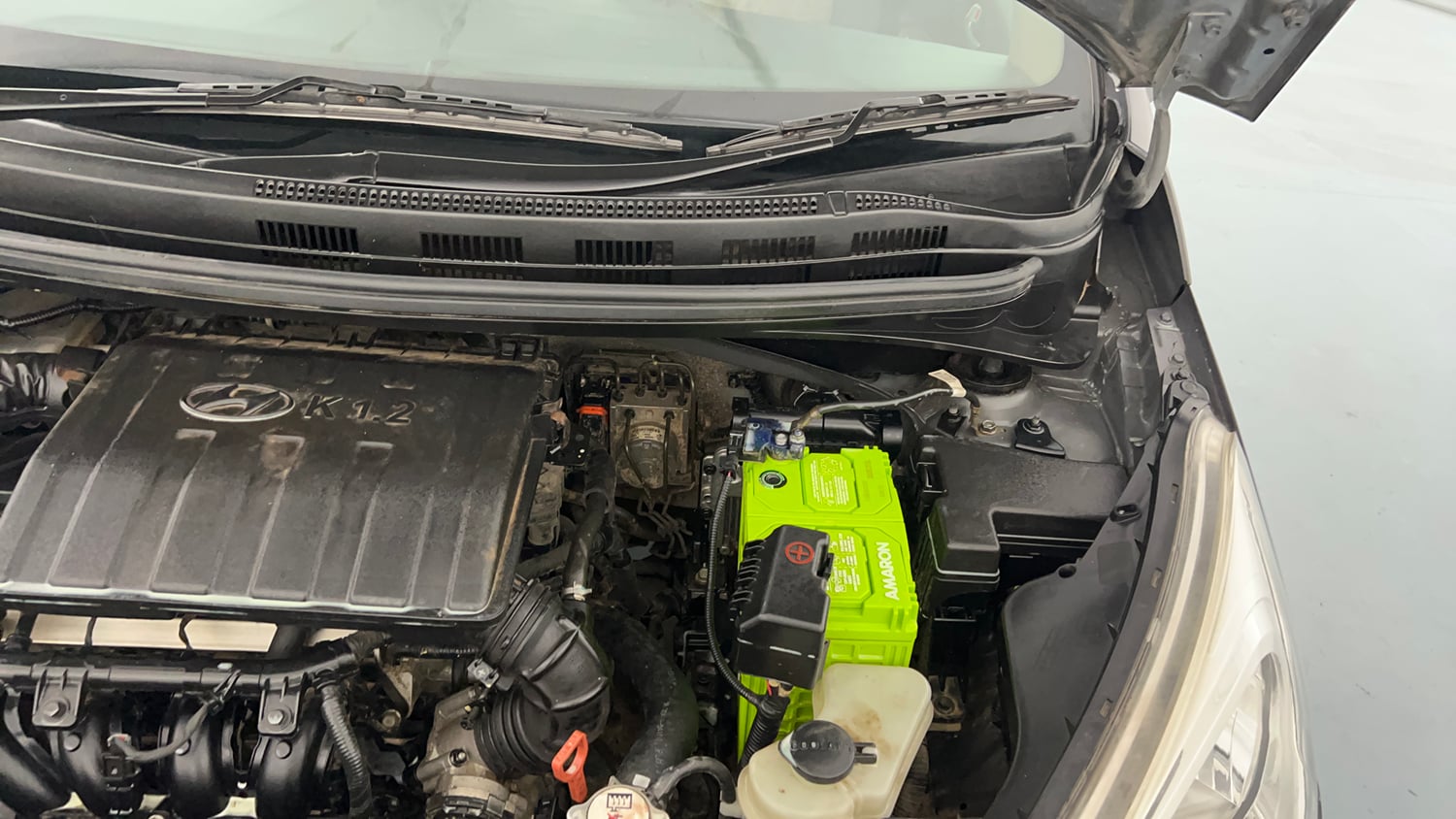 Used 2019 Hyundai Grand i10 Sportz AT 1.2 Kappa VTVT Petrol Automatic engine ENGINE LEFT SIDE HINGE & APRON VIEW