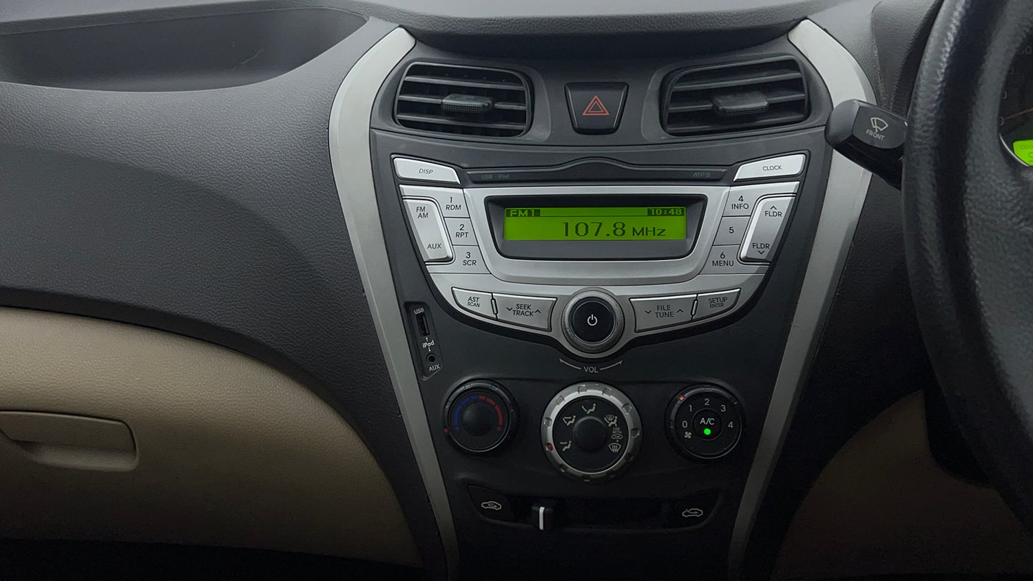 Used 2019 Hyundai Eon Magna + Petrol Manual top_features Integrated (in-dash) music system