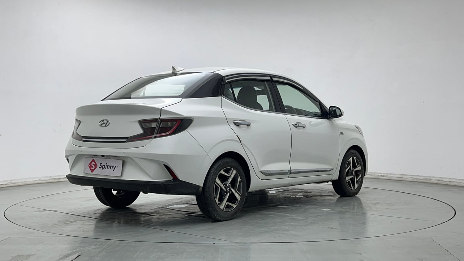 Used 2021 Hyundai Aura SX Plus 1.2 AMT Petrol Petrol Automatic exterior RIGHT REAR CORNER VIEW