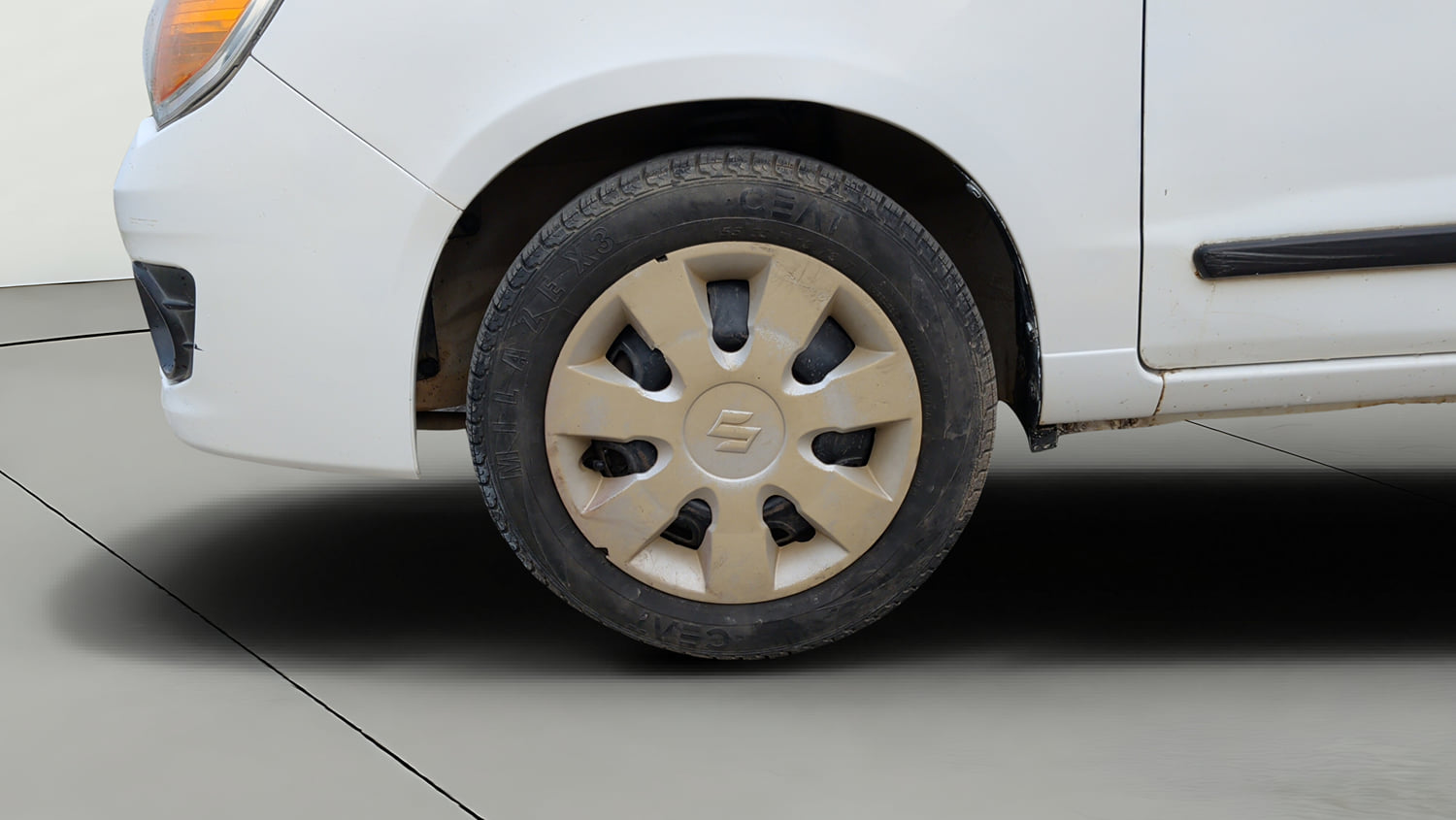 Used 2013 Maruti Suzuki Alto K10 VXi Petrol Manual tyres LEFT FRONT TYRE RIM VIEW