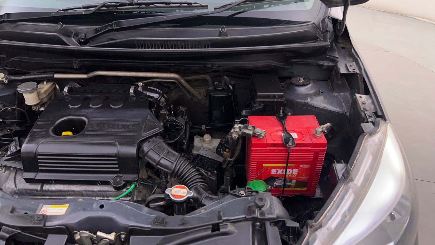 Used 2015 Maruti Suzuki Celerio ZXi AMT Petrol Automatic engine ENGINE LEFT SIDE HINGE & APRON VIEW