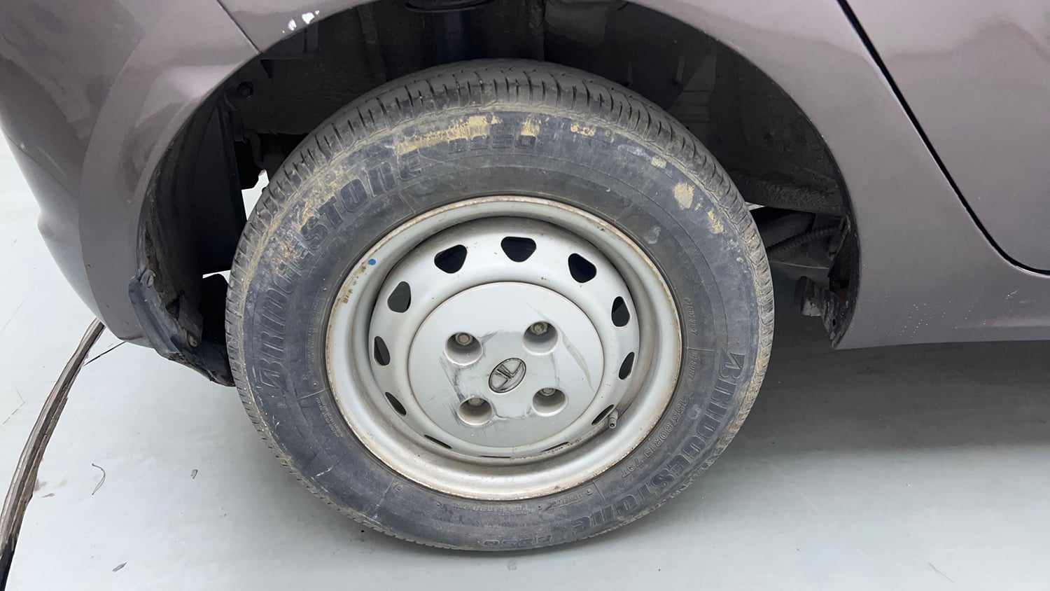 Used 2016 Tata Tiago Revotron XM Petrol Manual tyres RIGHT REAR TYRE RIM VIEW
