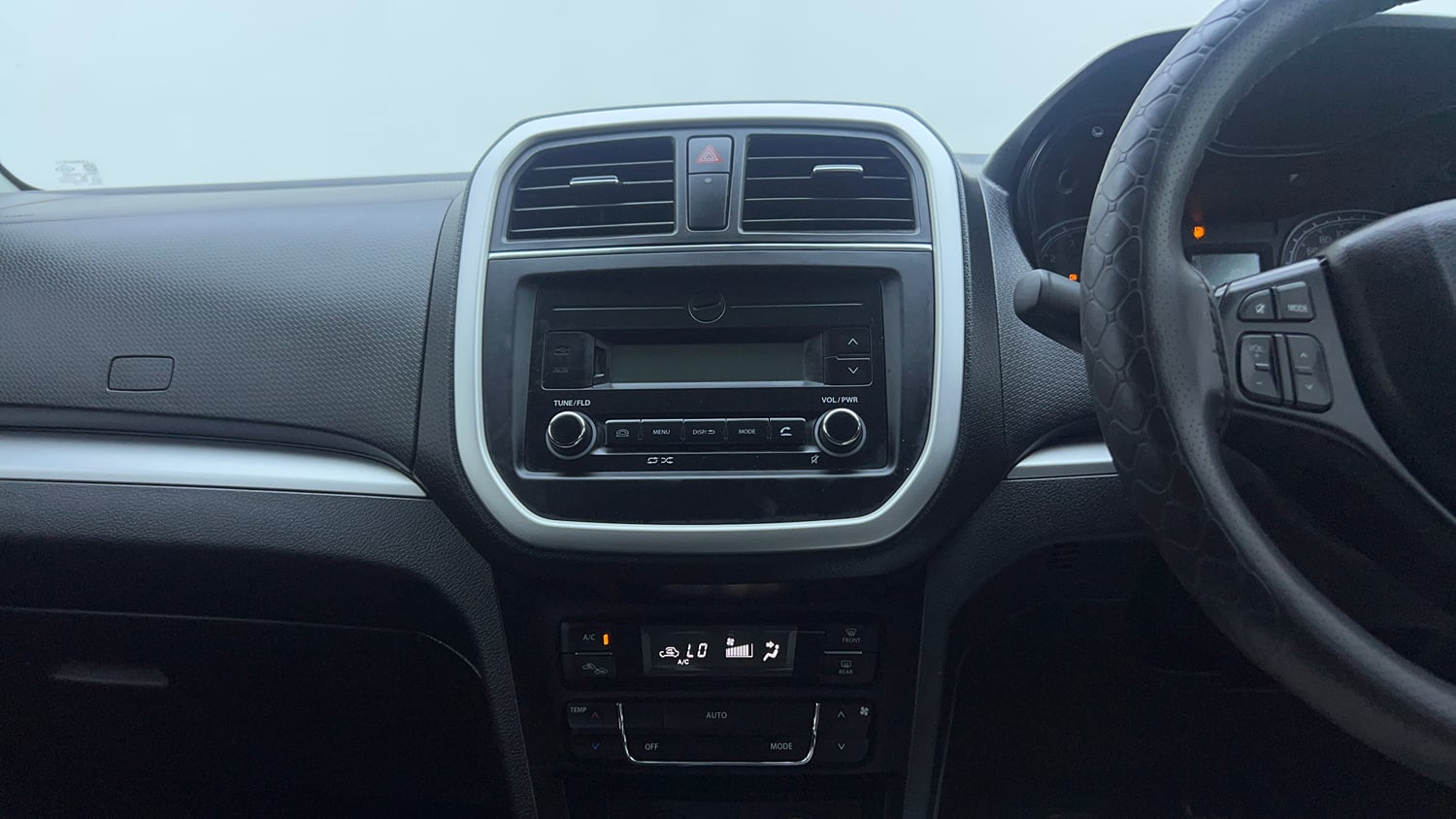 Used 2022 maruti-suzuki Vitara Brezza VXi Petrol Manual top_features Integrated (in-dash) music system