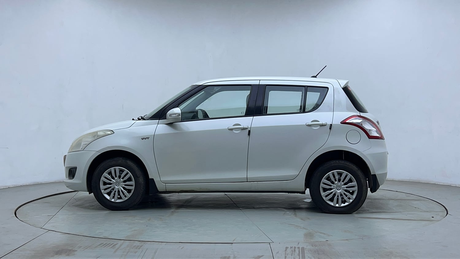 Used 2012 Maruti Suzuki Swift VXi Petrol Manual exterior LEFT SIDE VIEW