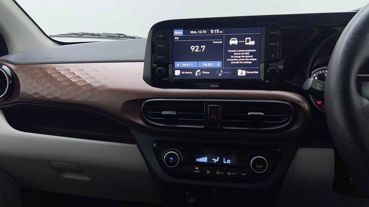 Used 2021 Hyundai Aura SX Plus 1.2 AMT Petrol Petrol Automatic top_features Integrated (in-dash) music system