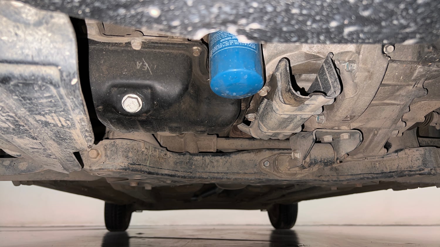 Used 2013 Hyundai Grand i10 Sportz 1.2 Kappa VTVT Petrol Manual extra FRONT LEFT UNDERBODY VIEW