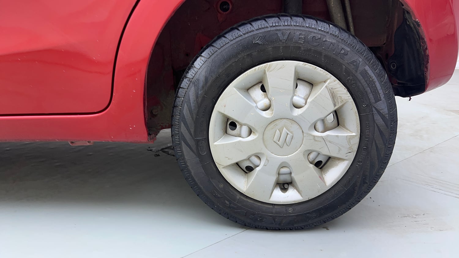 Used 2014 Maruti Suzuki Celerio LXi Petrol Manual tyres LEFT REAR TYRE RIM VIEW