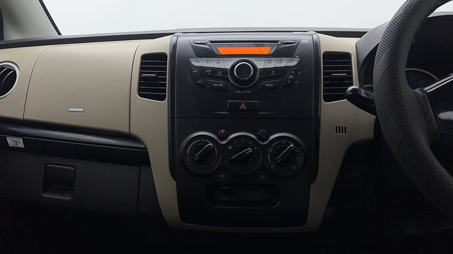 Used 2017 Maruti Suzuki Wagon R VXI Petrol Manual top_features Integrated (in-dash) music system