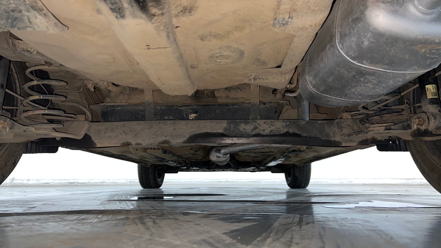 Used 2021 Hyundai Aura SX Plus 1.2 AMT Petrol Petrol Automatic extra REAR UNDERBODY VIEW (TAKEN FROM REAR)