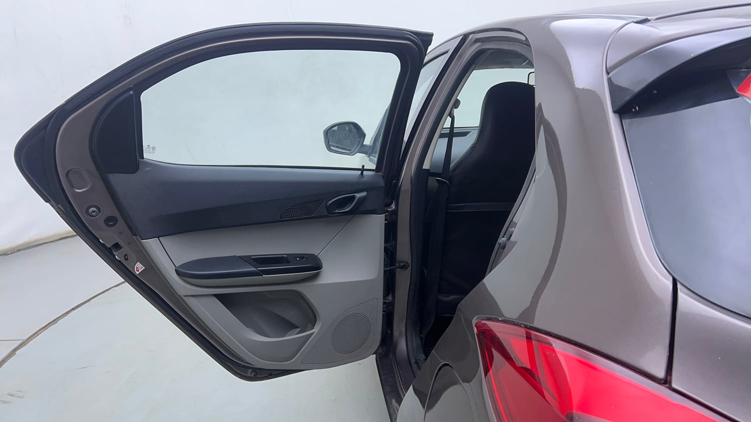 Used 2016 Tata Tiago Revotron XM Petrol Manual interior LEFT REAR DOOR OPEN VIEW