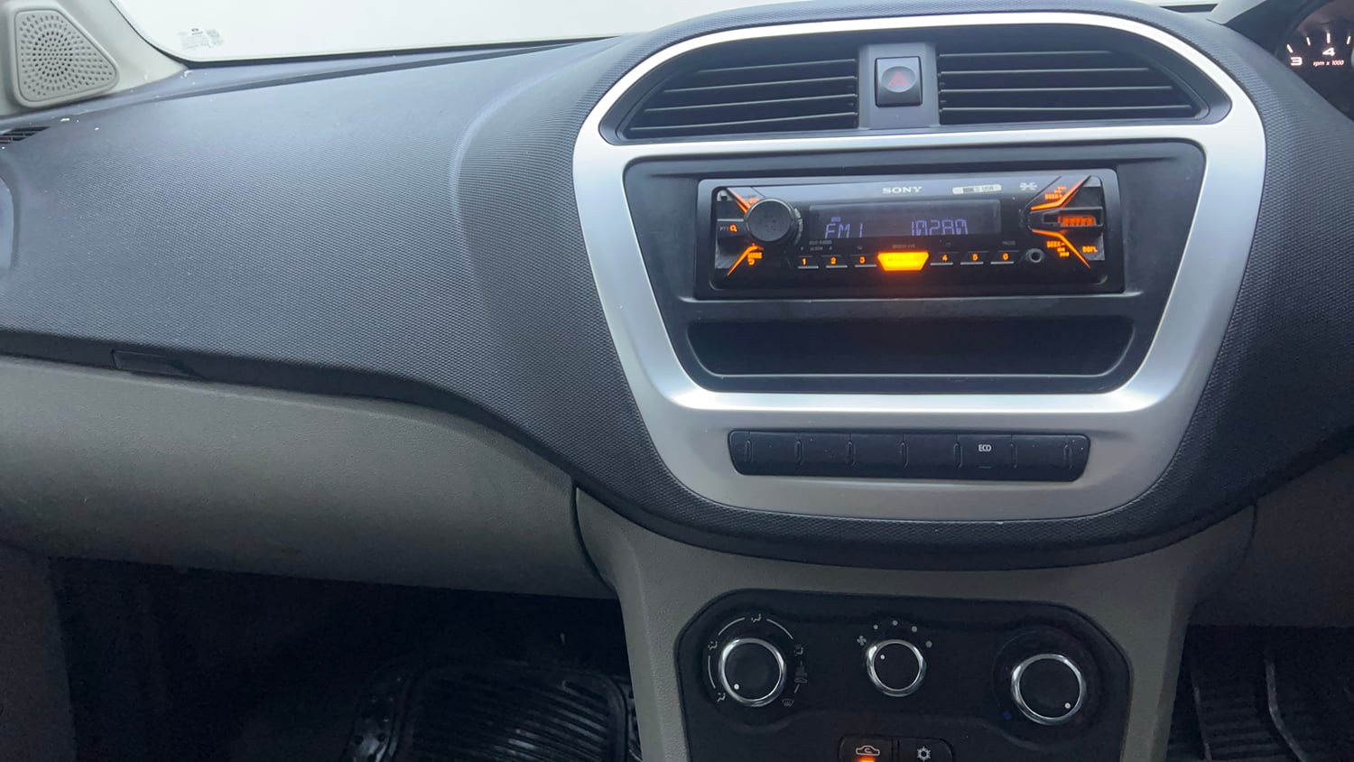 Used 2016 Tata Tiago Revotron XM Petrol Manual interior MUSIC SYSTEM & AC CONTROL VIEW