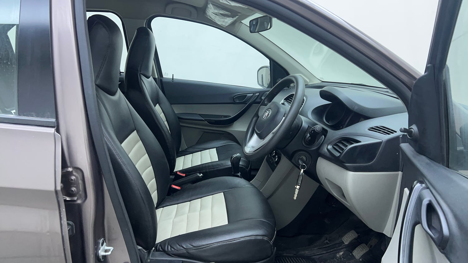 Used 2016 Tata Tiago Revotron XM Petrol Manual interior RIGHT SIDE FRONT DOOR CABIN VIEW