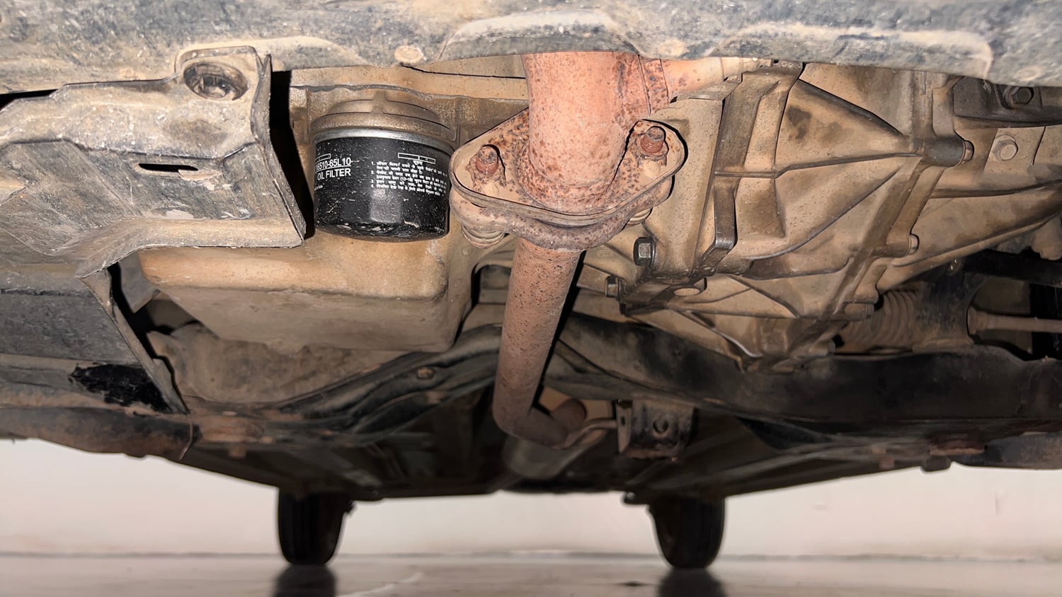Used 2015 Maruti Suzuki Celerio ZXi AMT Petrol Automatic extra FRONT LEFT UNDERBODY VIEW