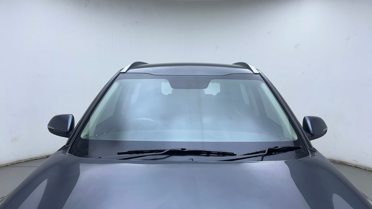 Used 2023 Kia Carens Prestige Plus 1.4 Petrol MT 7 STR Petrol Manual exterior FRONT WINDSHIELD VIEW
