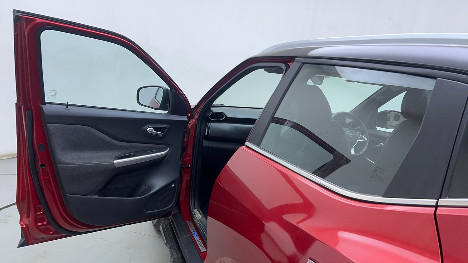 Used 2023 Nissan Magnite XV Premium Turbo CVT Dual Tone Petrol Automatic interior LEFT FRONT DOOR OPEN VIEW