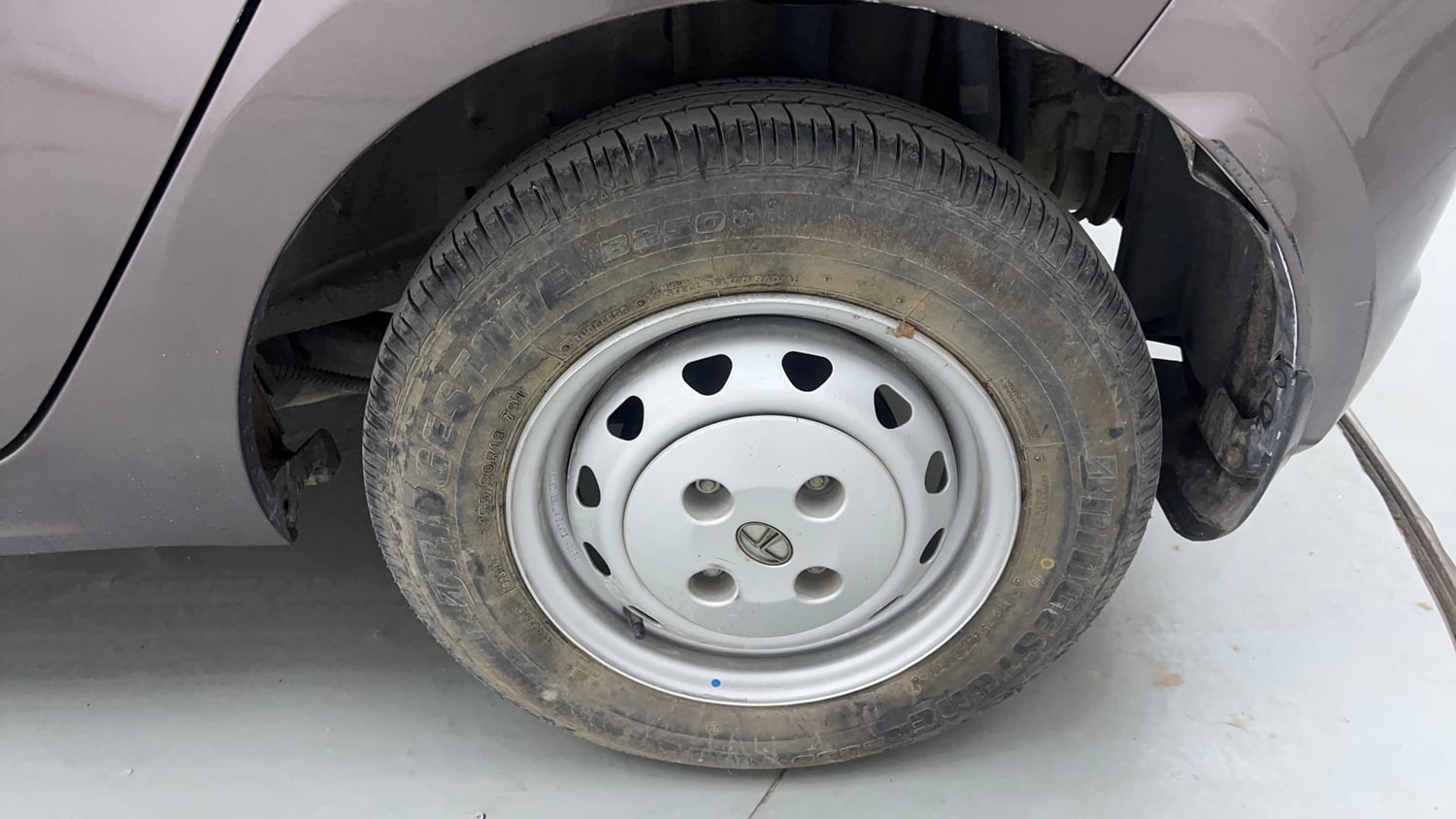 Used 2016 Tata Tiago Revotron XM Petrol Manual tyres LEFT REAR TYRE RIM VIEW