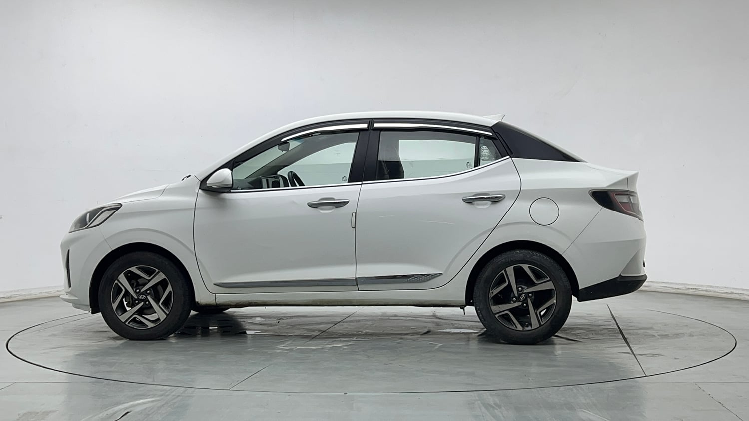 Used 2021 Hyundai Aura SX Plus 1.2 AMT Petrol Petrol Automatic exterior LEFT SIDE VIEW
