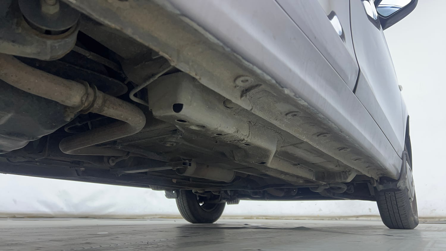 Used 2016 Tata Tiago Revotron XM Petrol Manual extra REAR RIGHT UNDERBODY VIEW