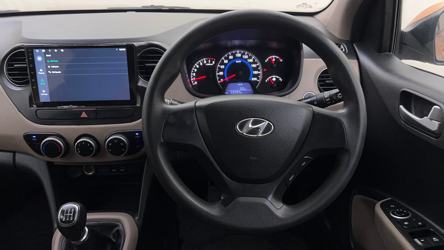Used 2013 Hyundai Grand i10 Sportz 1.2 Kappa VTVT Petrol Manual interior STEERING VIEW