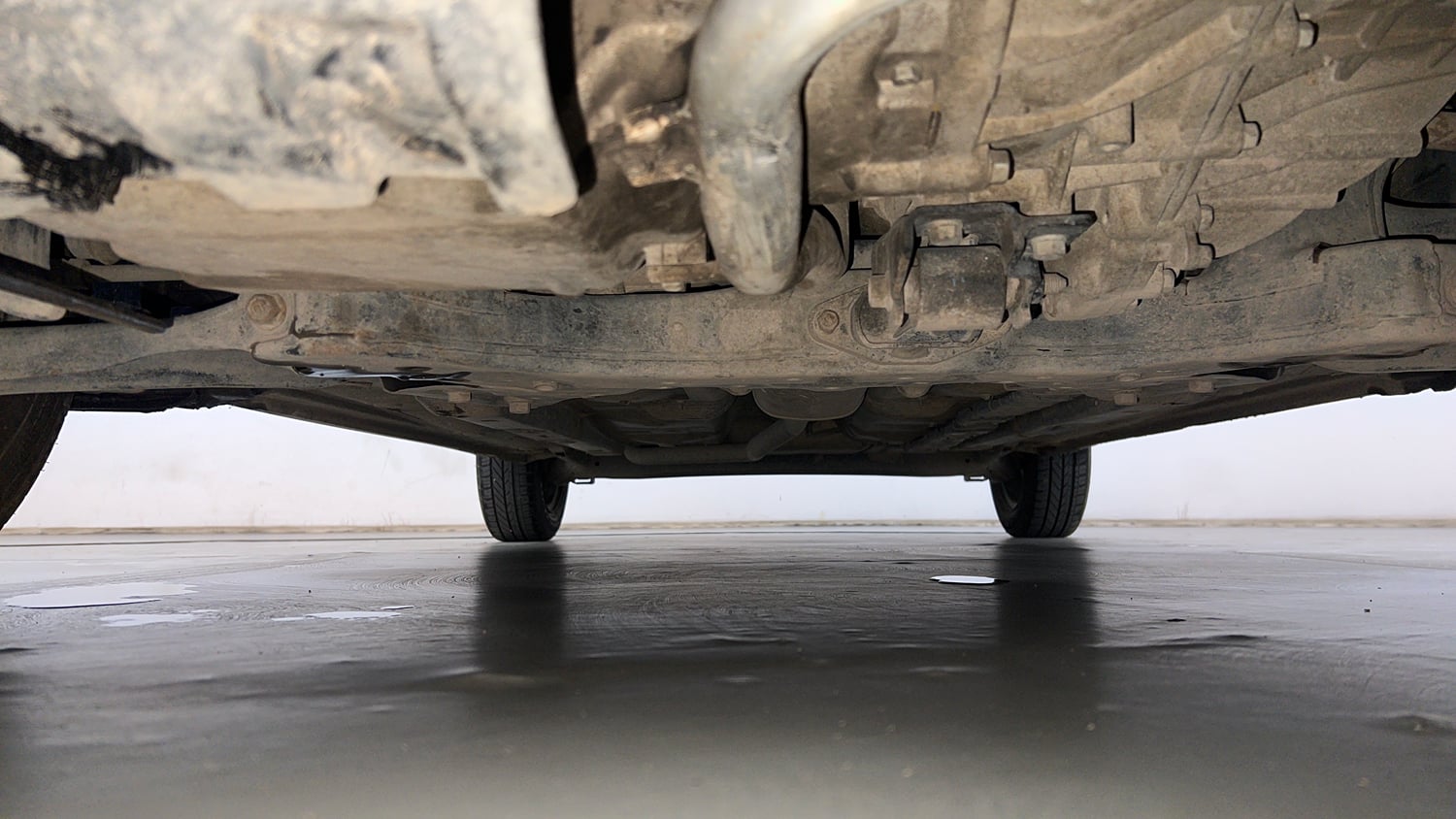 Used 2018 Hyundai Grand i10 Sportz (O) U2 1.2 CRDi Diesel Manual extra FRONT LEFT UNDERBODY VIEW