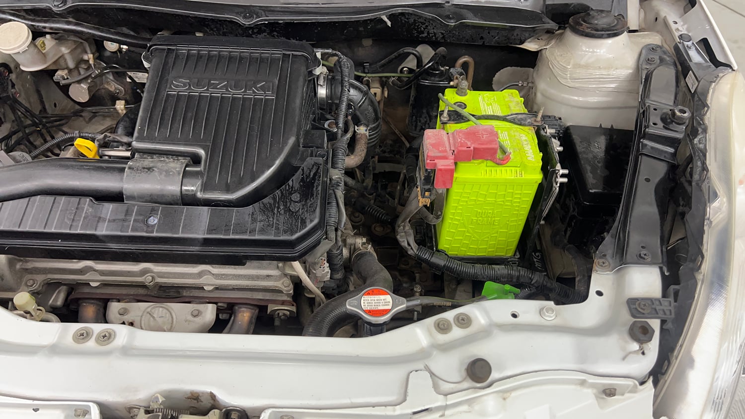 Used 2014 Maruti Suzuki Swift ZXi Petrol Manual engine ENGINE LEFT SIDE VIEW