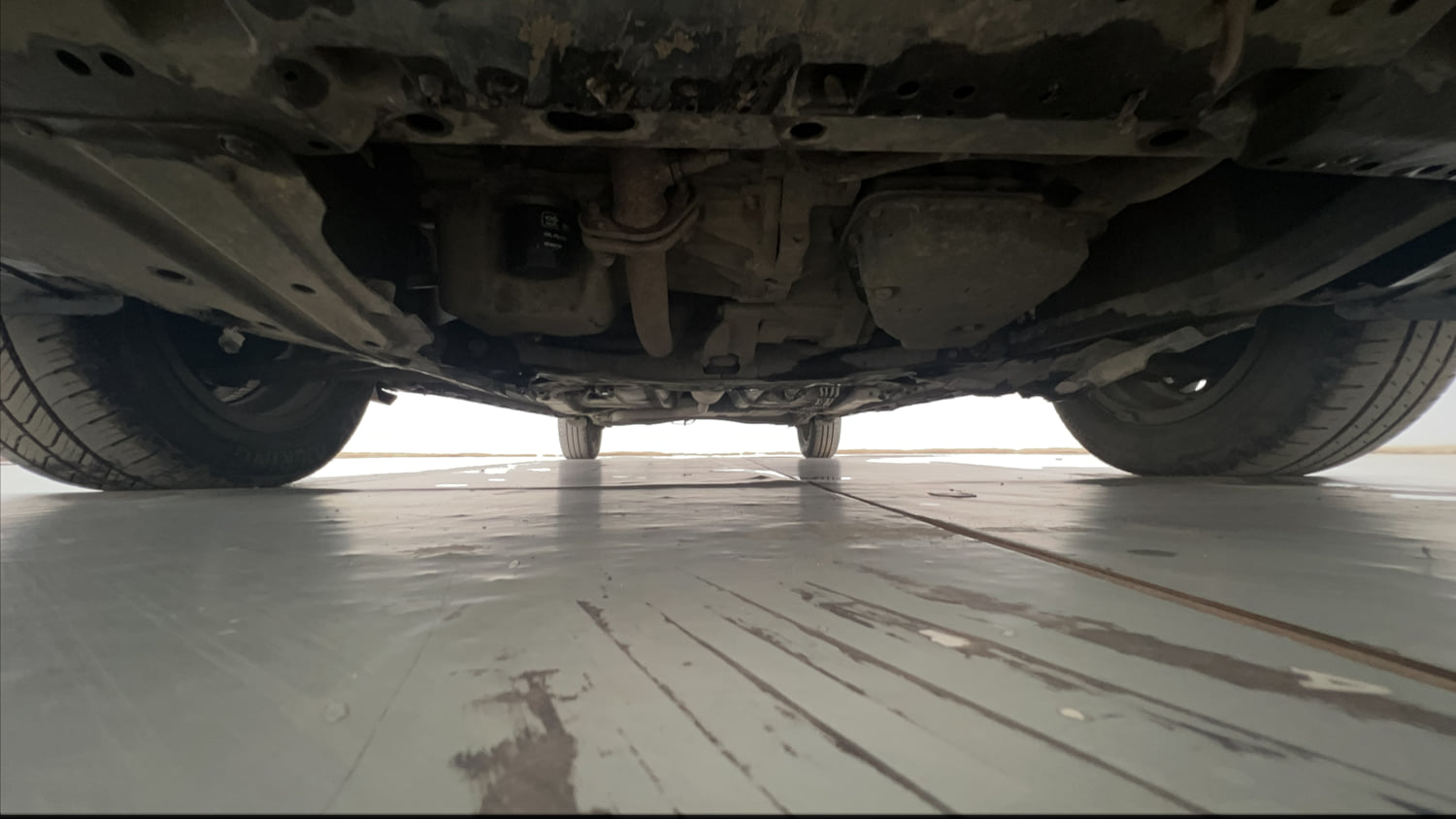 Used 2020 Maruti Suzuki XL6 Alpha AT Petrol Petrol Automatic extra FRONT LEFT UNDERBODY VIEW