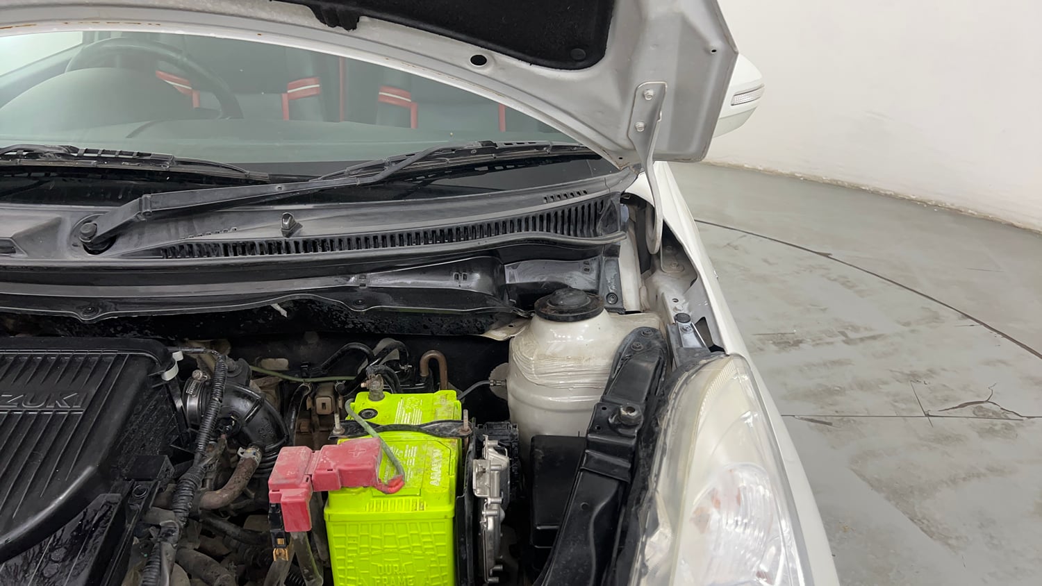 Used 2014 Maruti Suzuki Swift ZXi Petrol Manual engine ENGINE LEFT SIDE HINGE & APRON VIEW