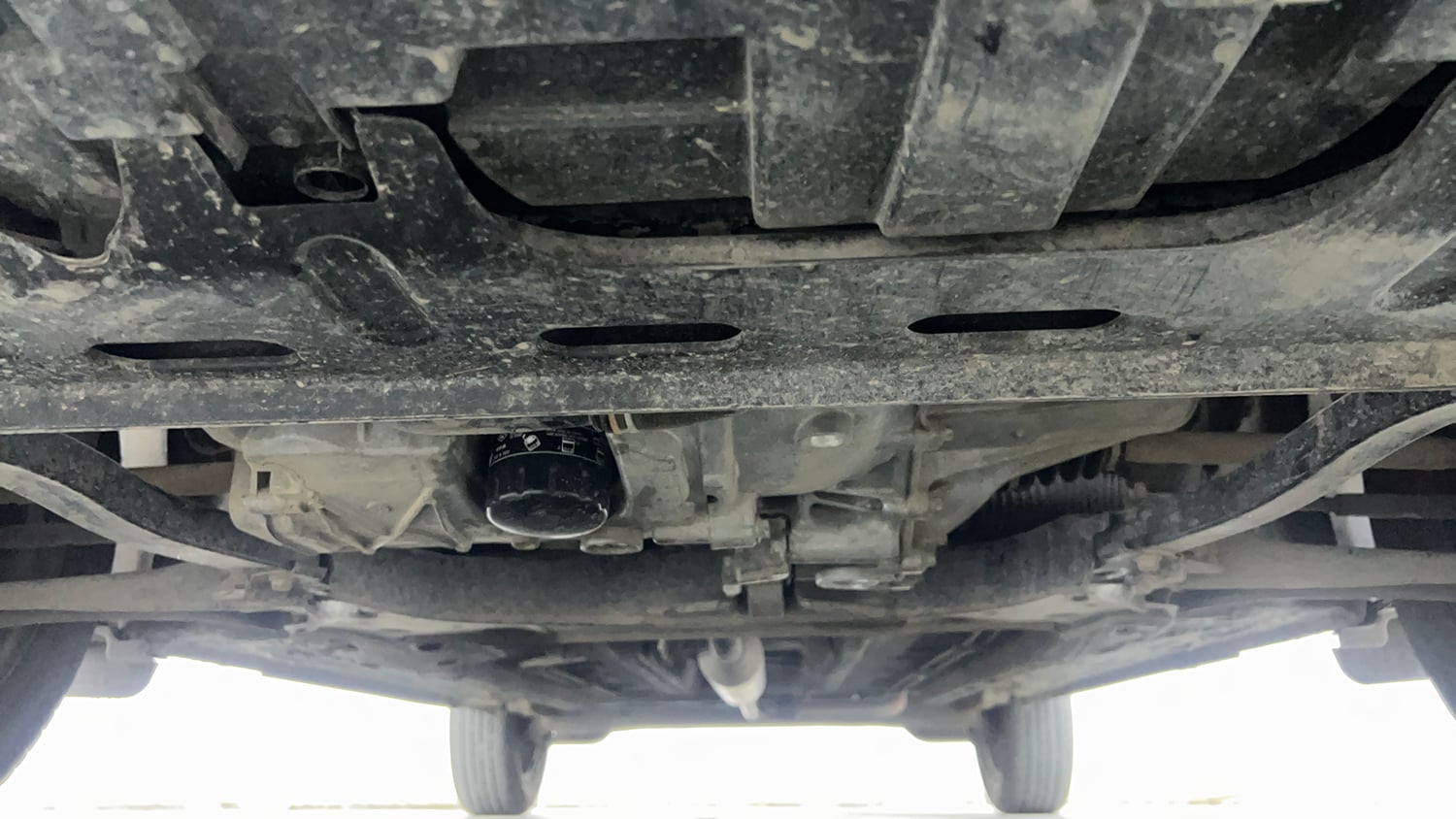 Used 2024 Nissan Magnite XE AMT Petrol Automatic extra FRONT LEFT UNDERBODY VIEW