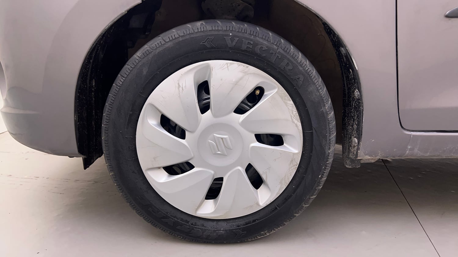 Used 2015 Maruti Suzuki Celerio ZXi AMT Petrol Automatic tyres LEFT FRONT TYRE RIM VIEW
