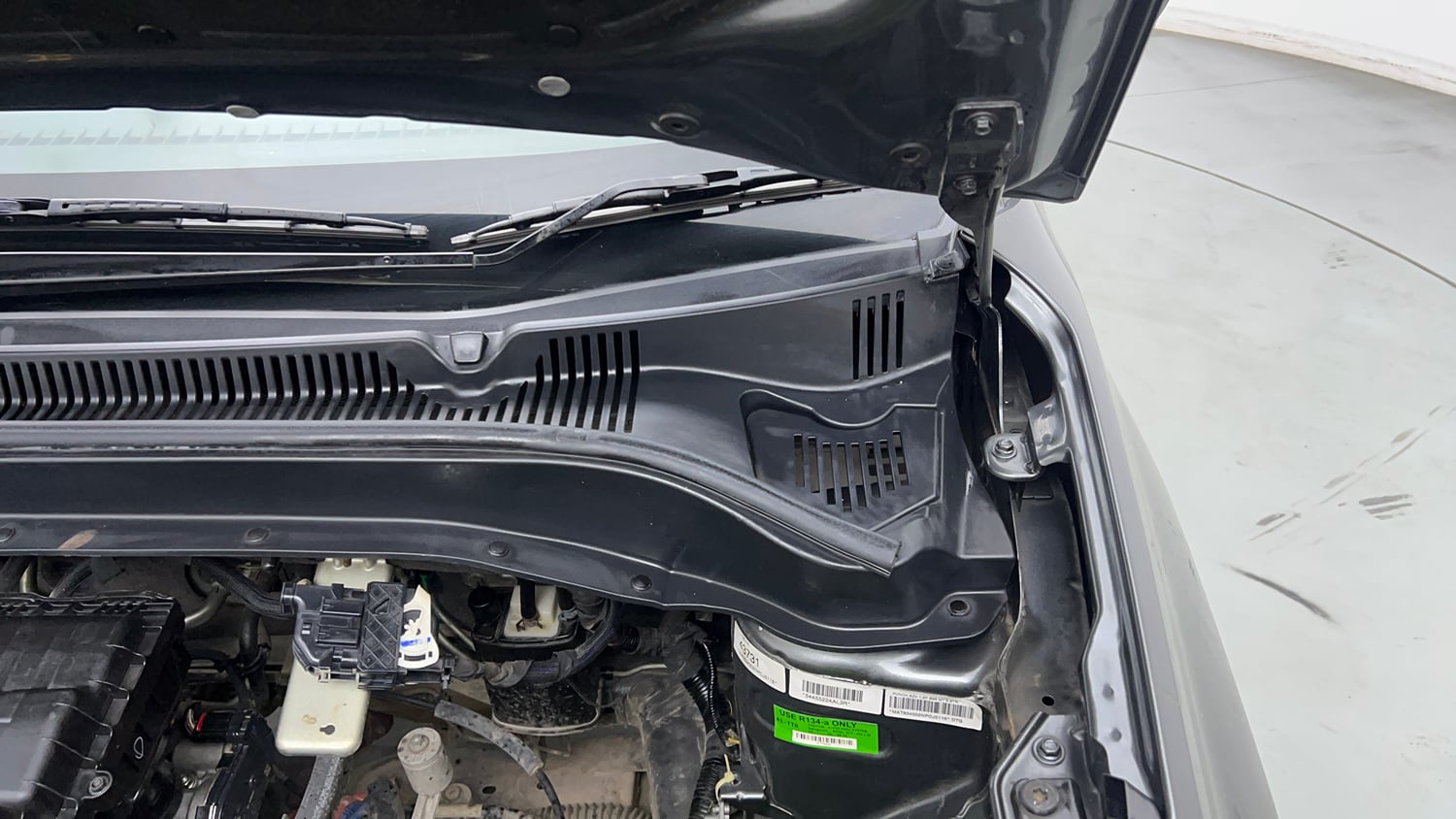 Used 2022 Tata Punch Adventure MT Petrol Manual engine ENGINE LEFT SIDE HINGE & APRON VIEW