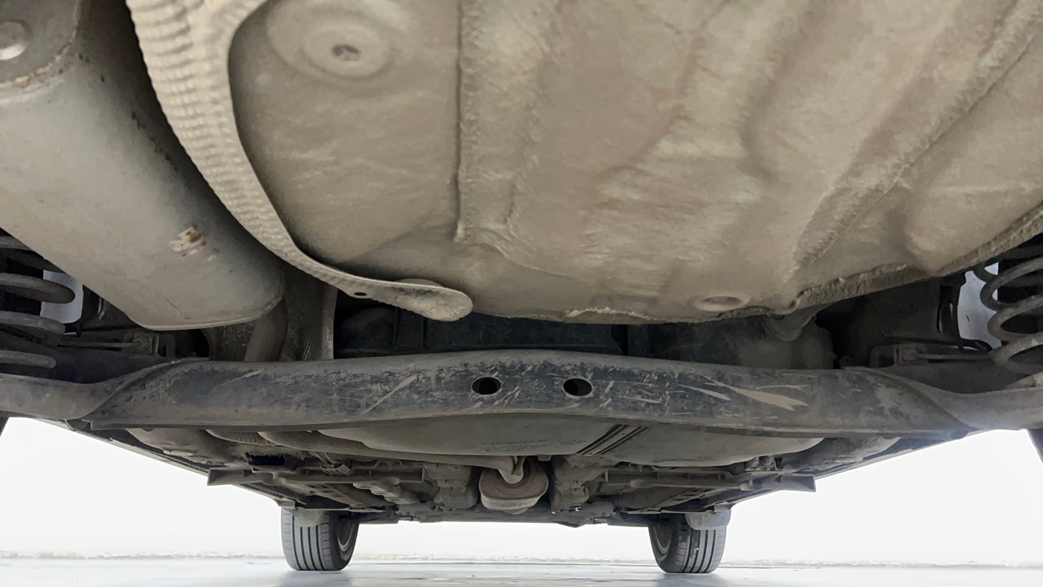 Used 2022 Volkswagen Taigun Topline 1.0 TSI MT Petrol Manual extra REAR UNDERBODY VIEW (TAKEN FROM REAR)