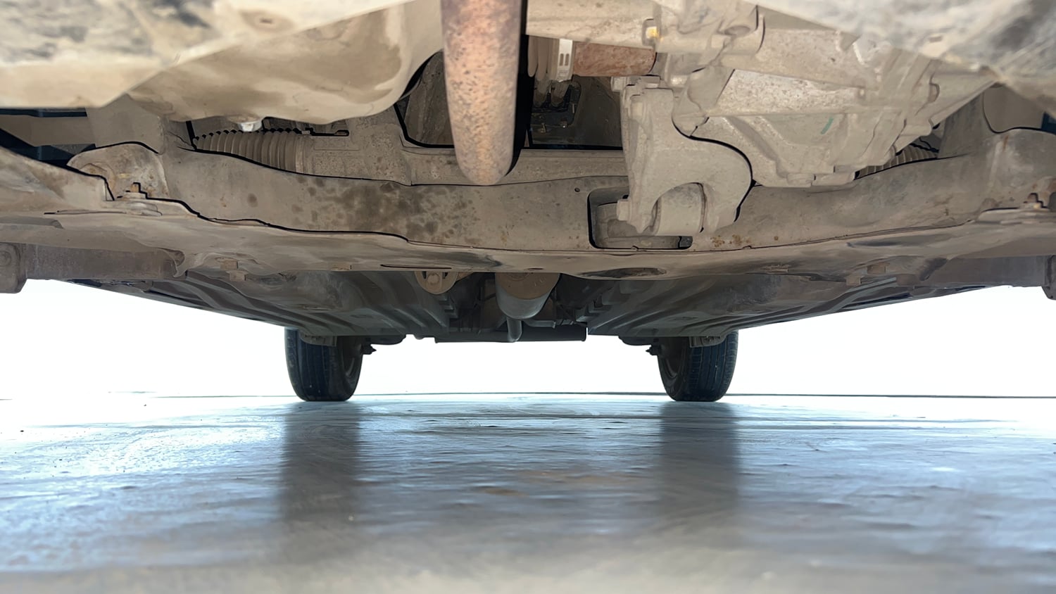 Used 2022 maruti-suzuki Vitara Brezza VXi Petrol Manual extra FRONT LEFT UNDERBODY VIEW