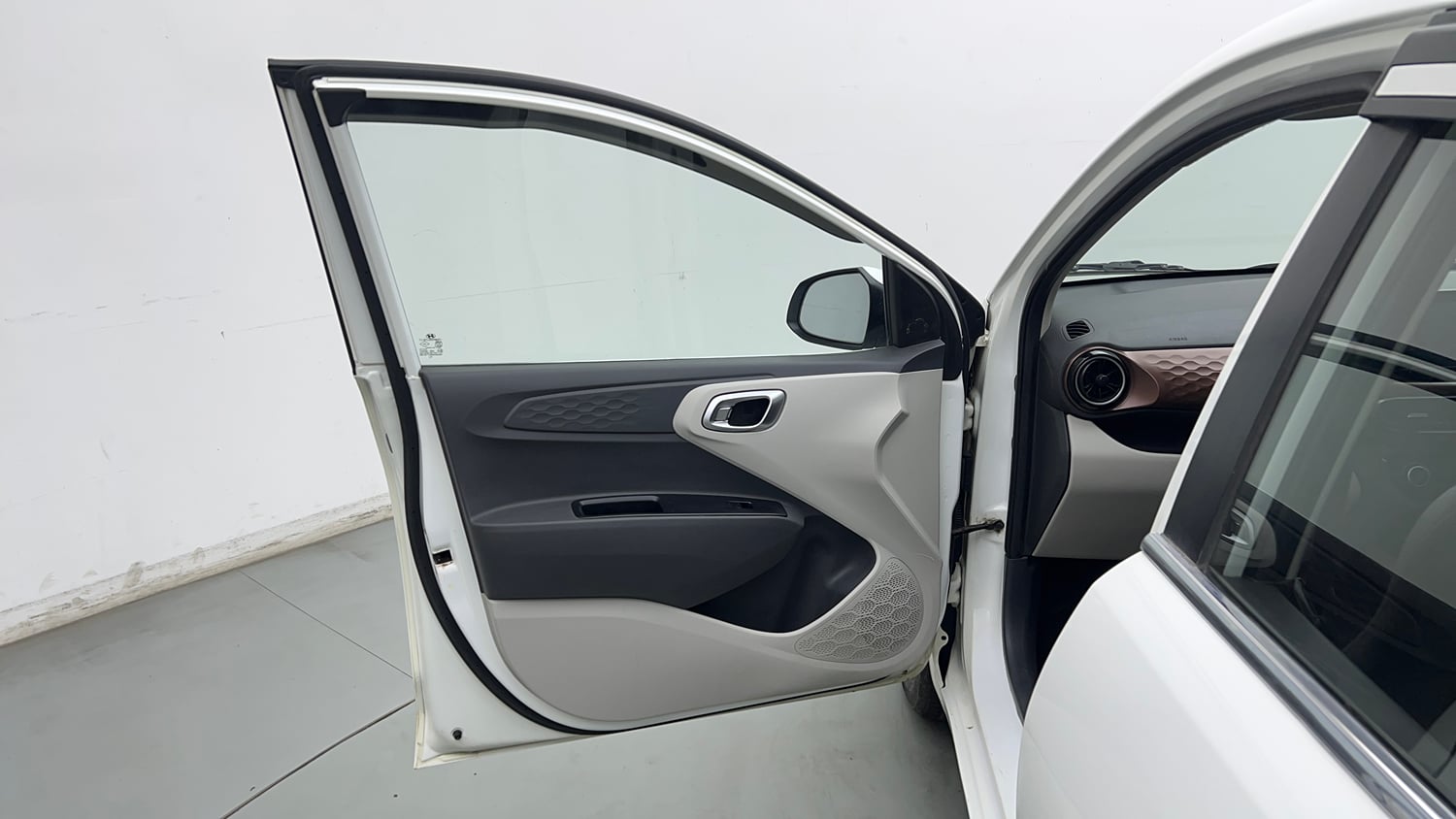 Used 2021 Hyundai Aura SX Plus 1.2 AMT Petrol Petrol Automatic interior LEFT FRONT DOOR OPEN VIEW