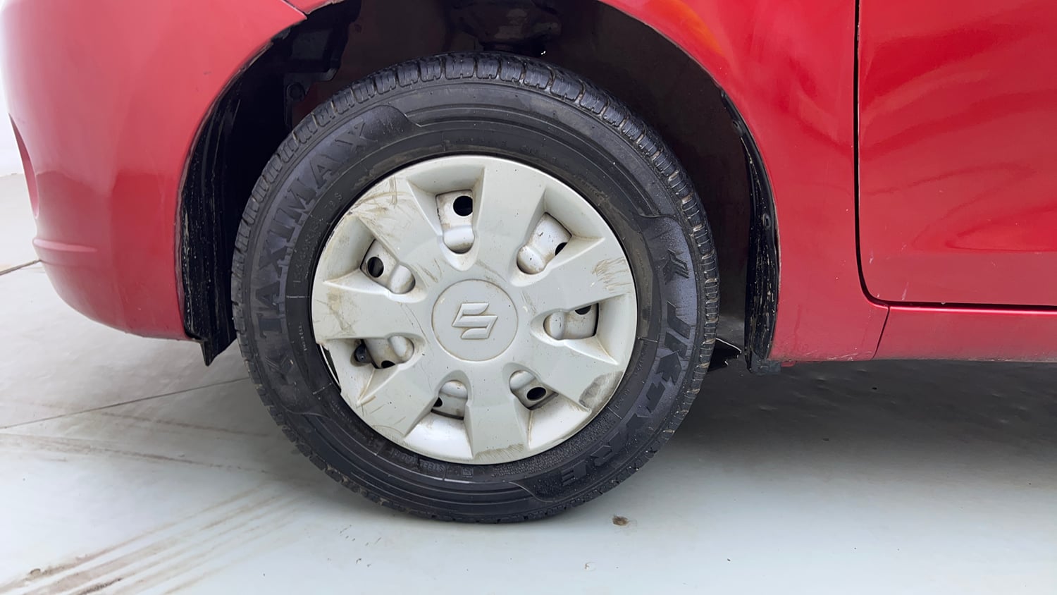 Used 2014 Maruti Suzuki Celerio LXi Petrol Manual tyres LEFT FRONT TYRE RIM VIEW