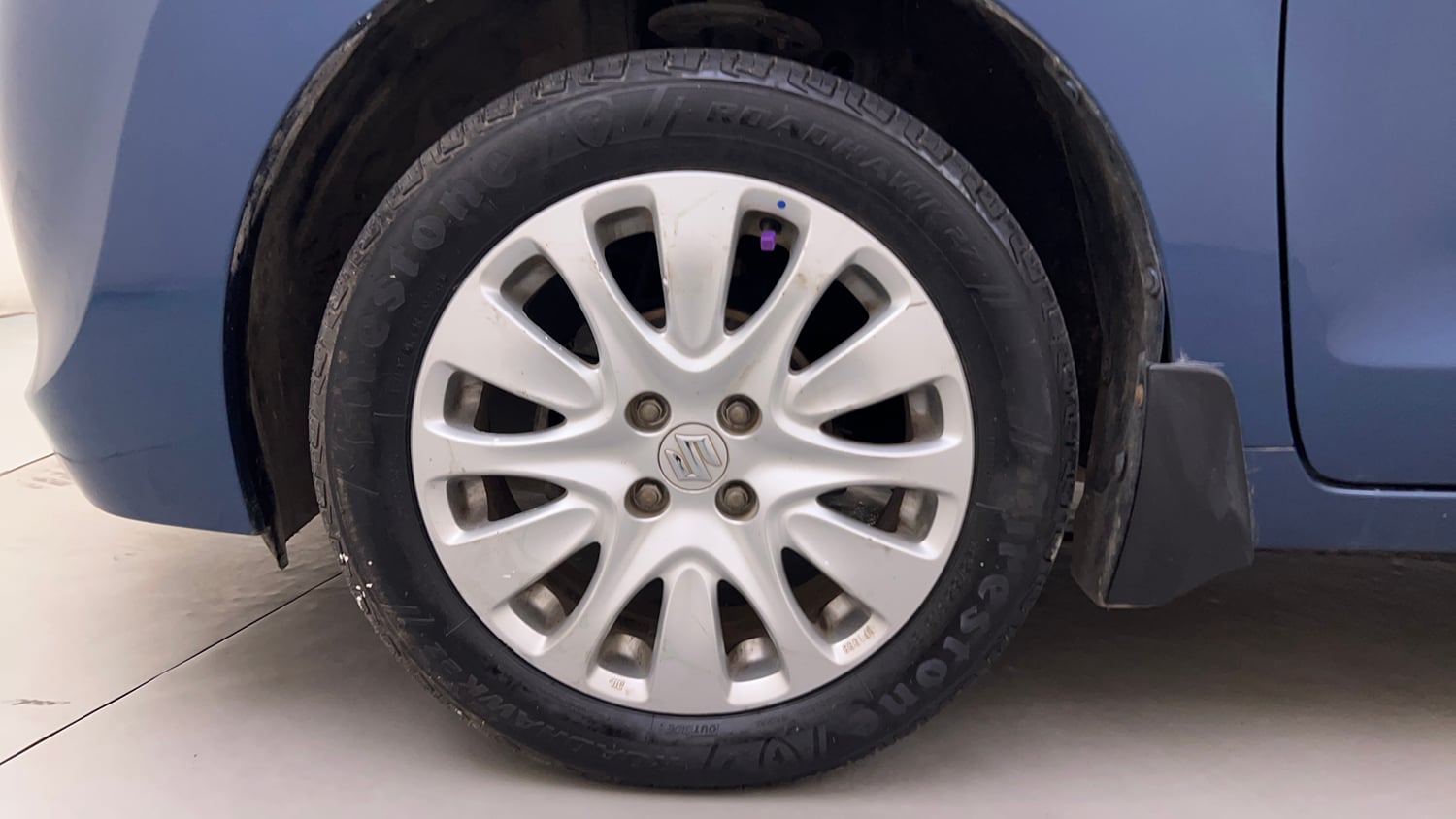 Used 2016 Maruti Suzuki Baleno Alpha 1.2 Petrol Manual tyres LEFT FRONT TYRE RIM VIEW