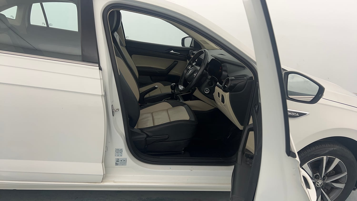 Used 2022 Skoda Slavia Style 1.0L TSI MT Petrol Manual interior RIGHT SIDE FRONT DOOR CABIN VIEW