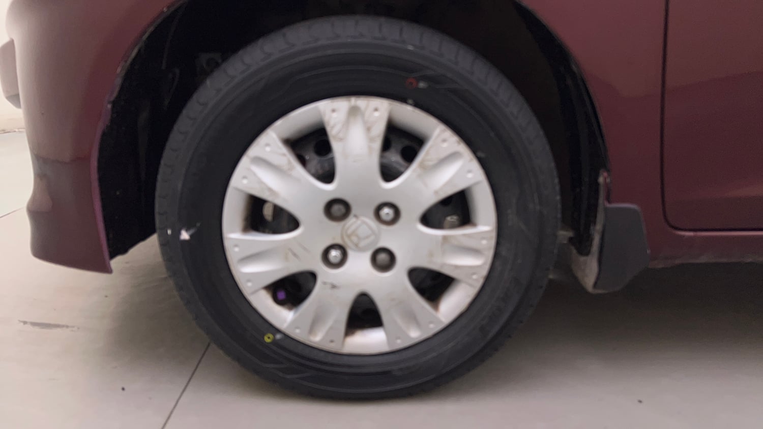 Used 2015 Honda Amaze 1.2 S i-VTEC Petrol Manual tyres LEFT FRONT TYRE RIM VIEW